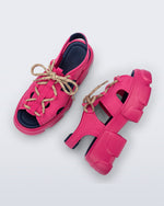 Top and side view of a pair of pink Camp platform sandals with beige laces and accents