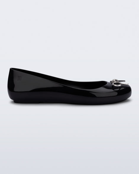 Side view of a black Sweet Love Chrome flat with silver bow