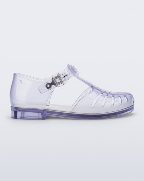 Side view of a clear Aranha 79 kids flat with buckle