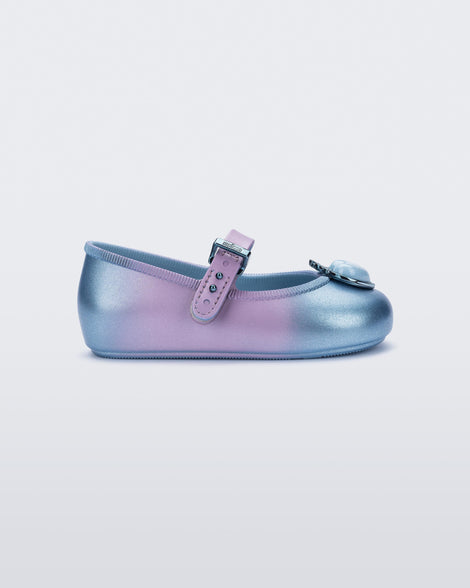 Side view of a blue/lilac Soft Ballerina Princess baby flat with a blue heart on top