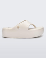 Side view of a beige Free Platform Thong sandal