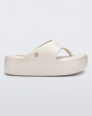 Product element, title Free Platform Thong in Beige
 price $89.00