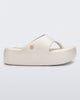 Side view of a beige Free Platform Thong sandal