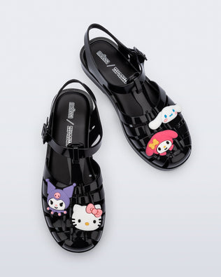 Top view of a pair of red Possession + Hello Kitty and Friends fisherman sandals with Hello Kitty and friends on the upper