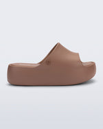 Side view of a brown Free Platform Slide sandal 