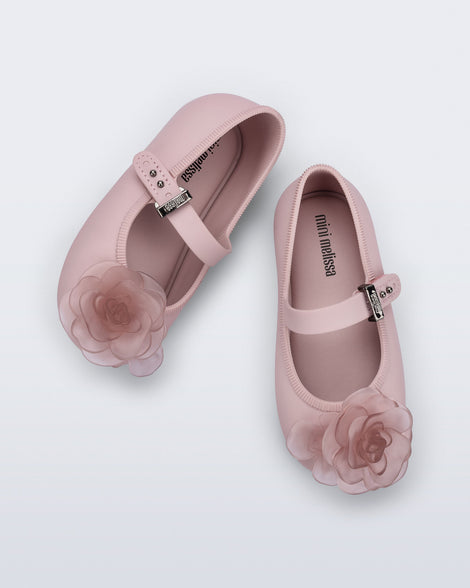 Top view of a pair of pink Soft Ballerina baby flats with pink flowers