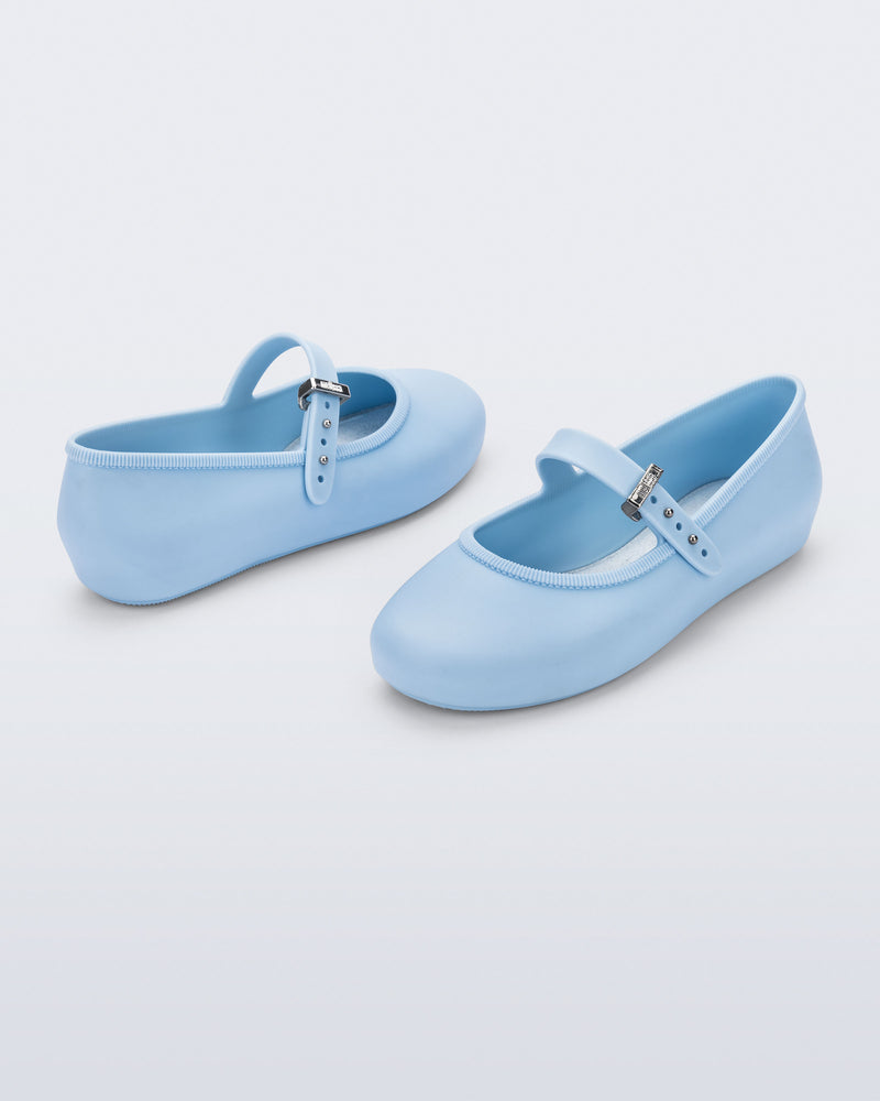 Side and top angled view of a pair of blue Soft Ballerina kids flats
