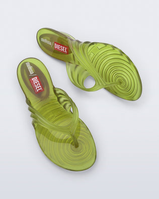 Side and top view of a pair of clear yellow Quantum Flip Flops