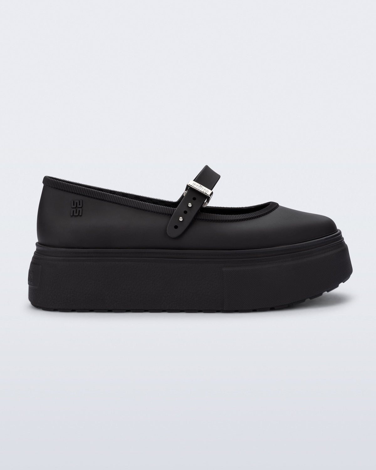 Side view of a black Soft Ballerina Platform flats