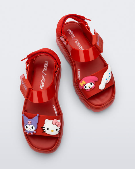 Top view of a pair of red Kick Off Sandals + Hello Kitty and Friends with Hello Kitty and Friends on the upper strap