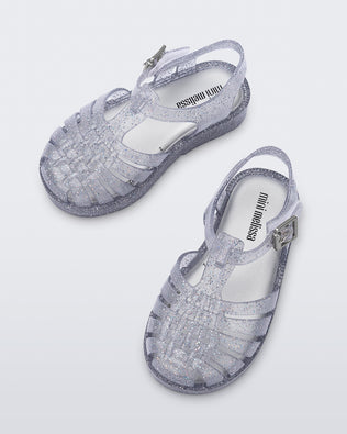 Top view of a pair of silver/glitter Possession babu fisherman sandals