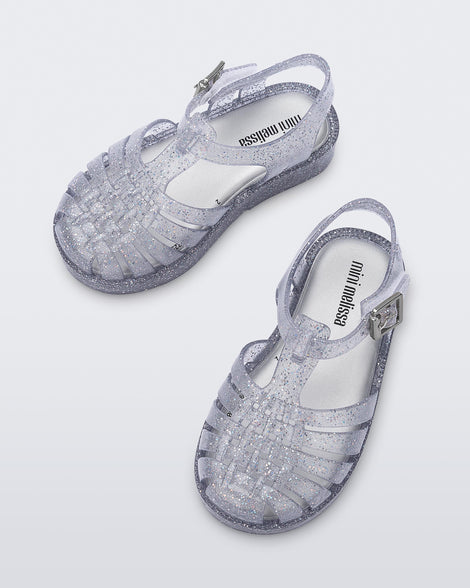 Top view of a pair of silver/glitter Possession babu fisherman sandals