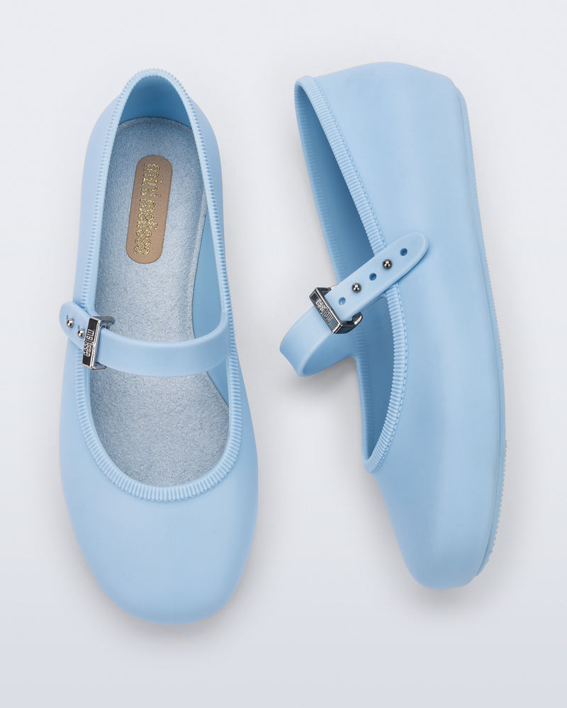 Top and side view of a pair of blue Soft Ballerina kids flats