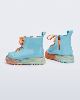 Product element, title Coturno in Blue/Orange
 price $26.00