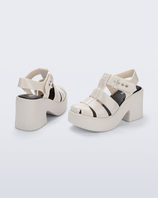 Back and side view of a pair of beige Lulu platform heel fisherman sandals