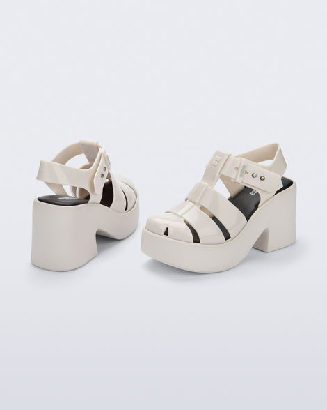 Back and side view of a pair of beige Lulu platform heel fisherman sandals