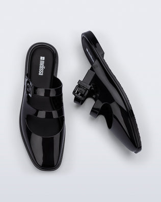 Side and top view of a pair of black Anastasia mule slides