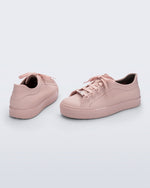 Back and angled view of a pair of pink Wow Sneakers with pink laces