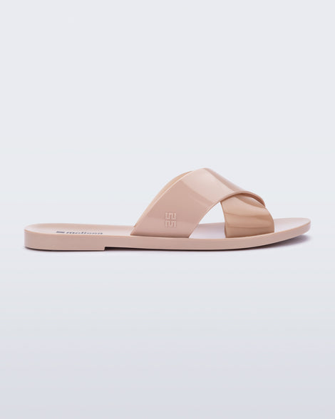 Side view of a pink Essential Cross Slide sandal