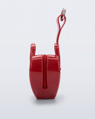 Side view of a red Heartbeat Pocket bag charm