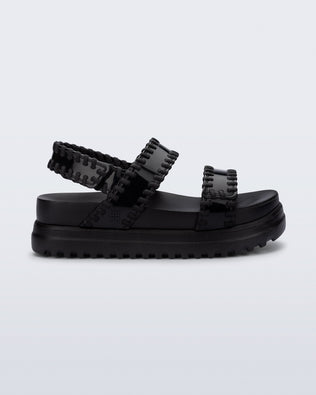 Side view of a black Dune Platform Sandal with faux stitching on the straps