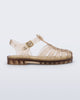 Side view of a transparent beige Possession kids sandal