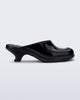 Side view of a black Gaia kitten heel with peep toe