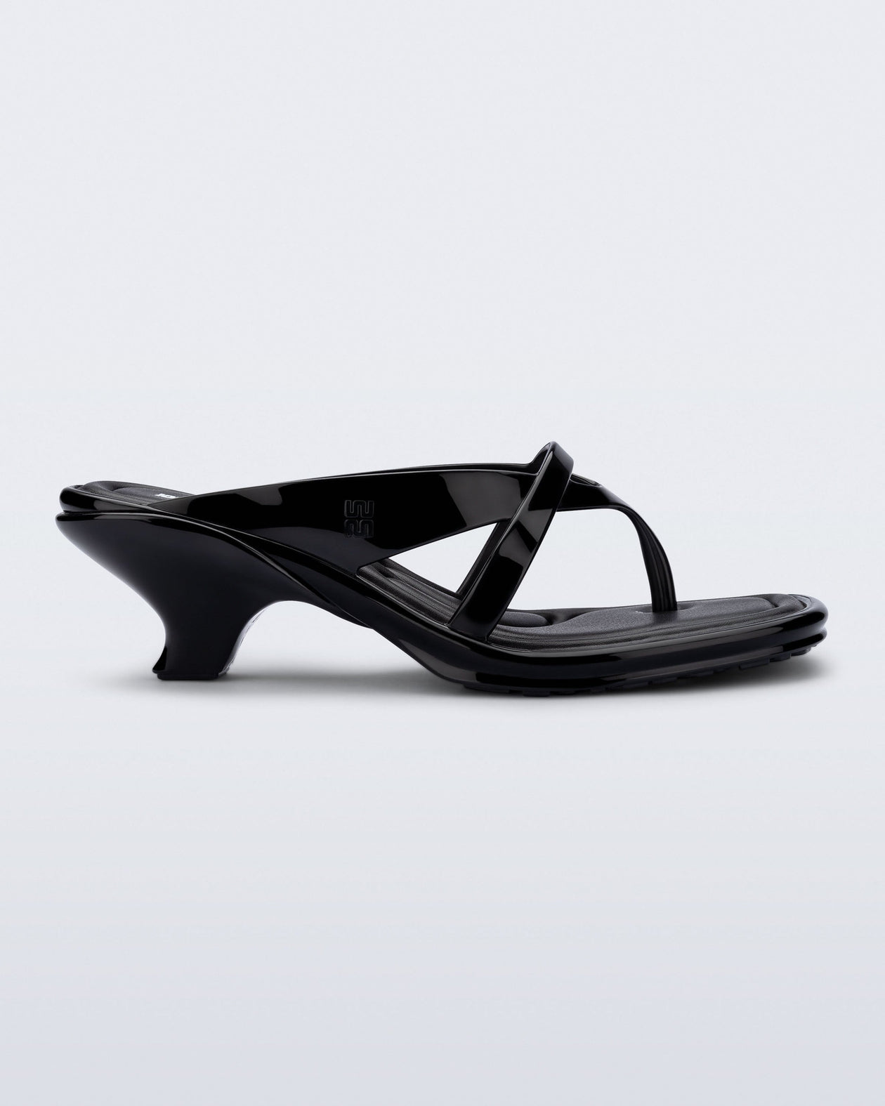 Side view of a black Layla kitten heel flip flop
