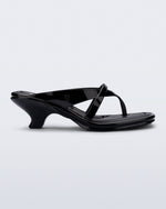 Side view of a black Layla kitten heel flip flop