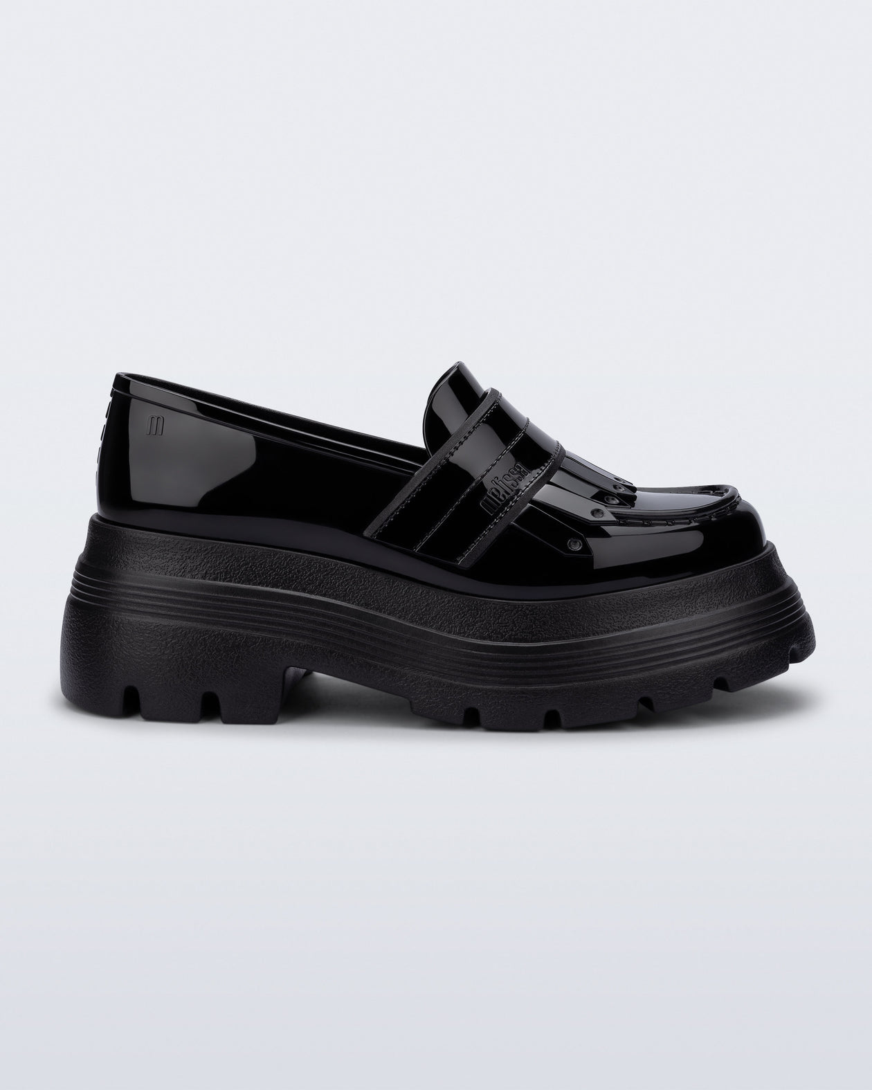 Side view of a black Royal Plus platform loafer