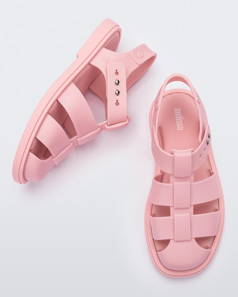 Side and top view of a pair of pink Emma women's sandals.