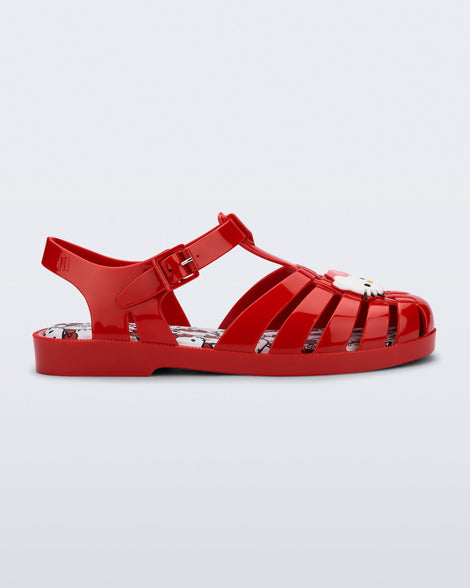 Side view of a red Possession + Hello Kitty and Friends fisherman sandal with Hello Kitty and friends on the upper