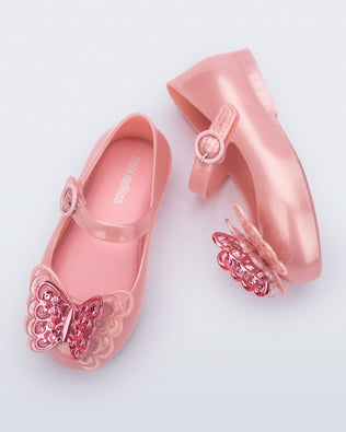 Top and side view of a pair of pink Sweet Love Butterfly baby flats
