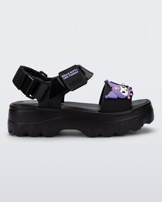 Side view of a black Kick Off Sandal + Hello Kitty and Friends with Hello Kitty and Friends on the upper strap
