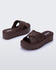 Back and side view of a pair of brown M Lover Cross Strap platform slides