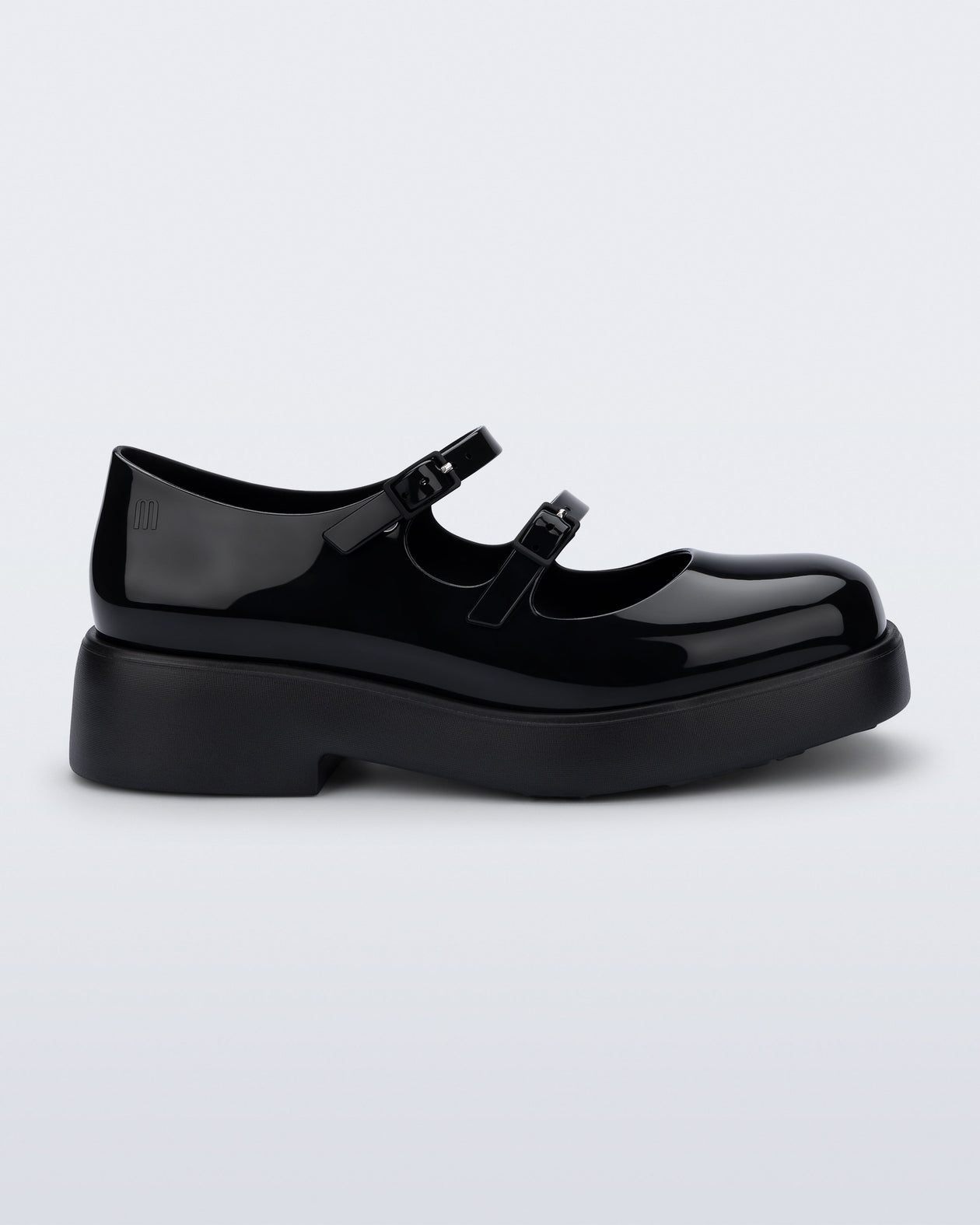 Side view of a black Farah Low Mary jane loafer