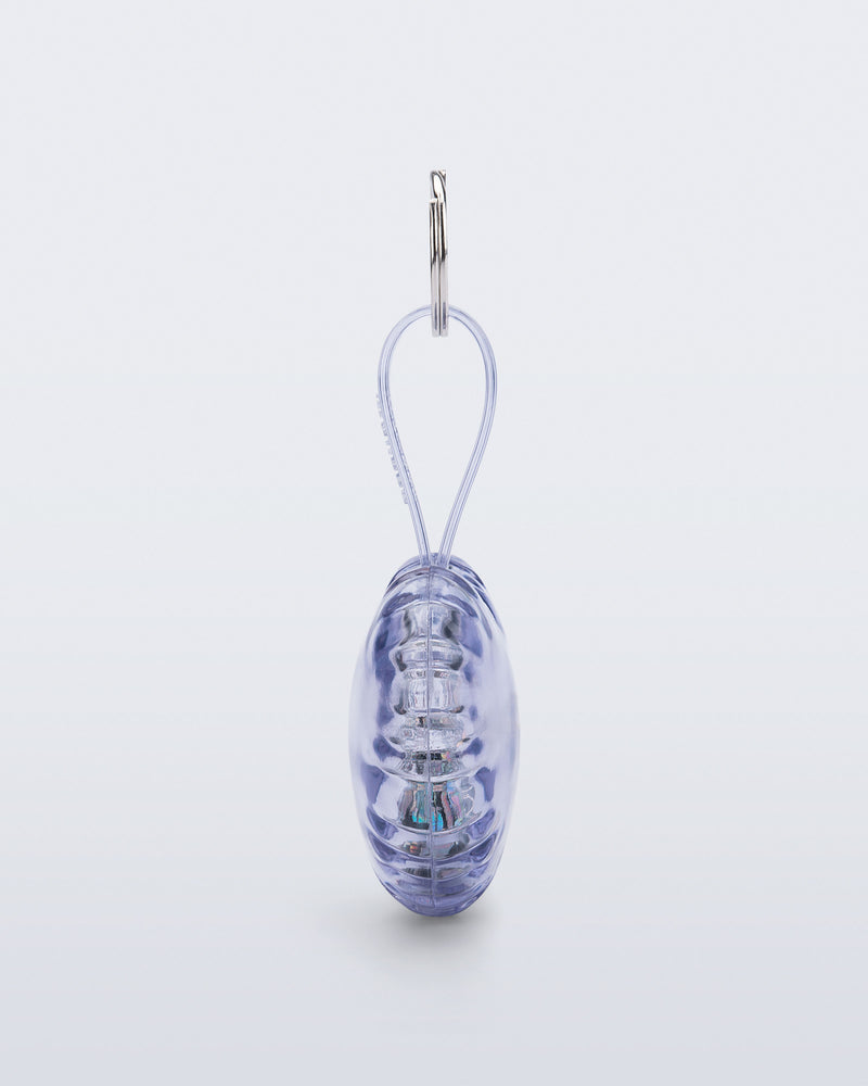 Side view of a clear with glitter Heart bag charm