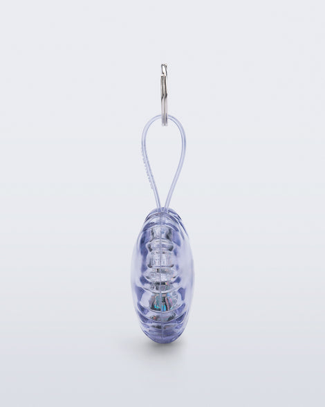 Side view of a clear with glitter Heart bag charm