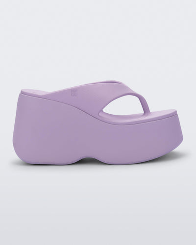 Side view of a lilac Free Thong Wedge Platform heel