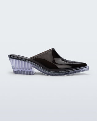 Product element, title Texas Mule in Black/Clear
 price $129.00