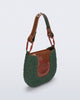 Angled view of a dark green Nina Bag + Alexandre Pavao shoulder bag with brown accents