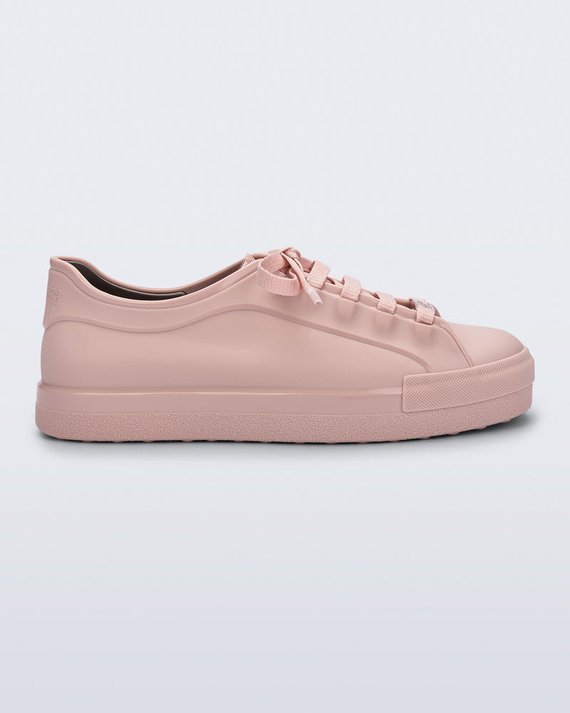 Side view of a pink Wow Sneaker with pink shoe laces
