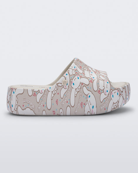 Side view of a beige Hello Kitty + Friends Free Platform with Hello Kitty and Friends print