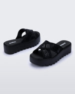 Back and side view of a pair of black M Lover Cross Strap platform slides