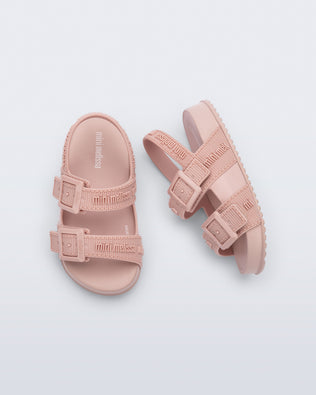 Top and side view of a pair of pink Cozy M Lover baby sandals