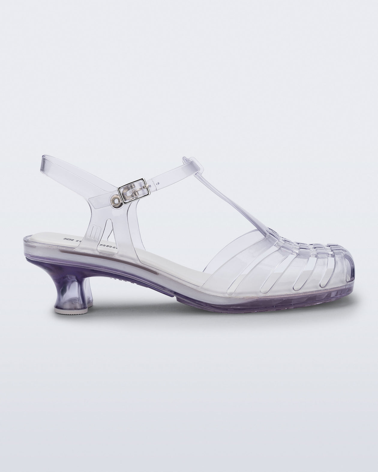 Side view of a clear Vixen Kitten Heel sandal