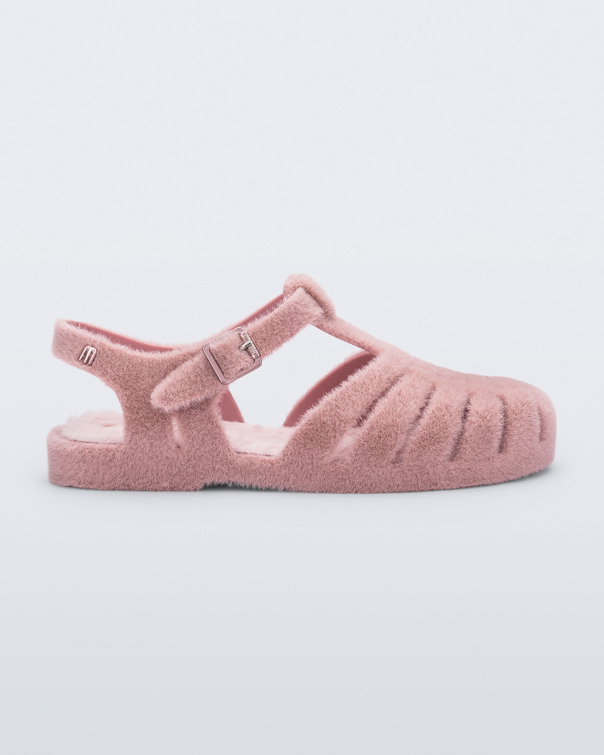Side view of a pink fuzzy Possession Warm fisherman sandal with fuzzy insole