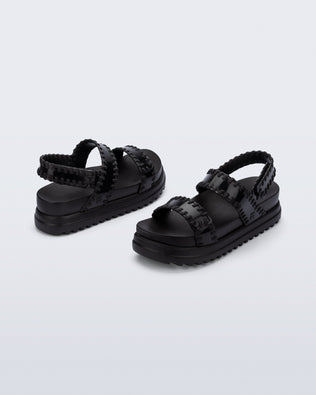 Back and angled view of a pair of black Dune Platform Sandals with faux stitching on the straps