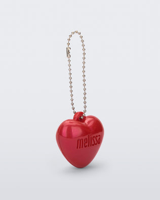 Angled view of a red Heart Charm