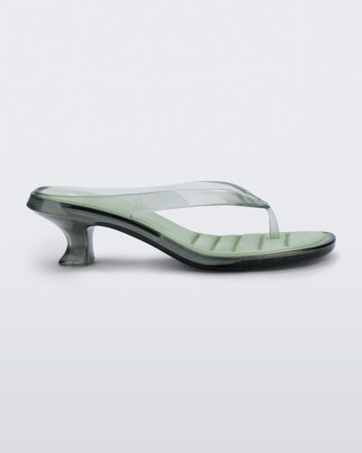 Side view of a transparent green Flip Flop Kitten Heels